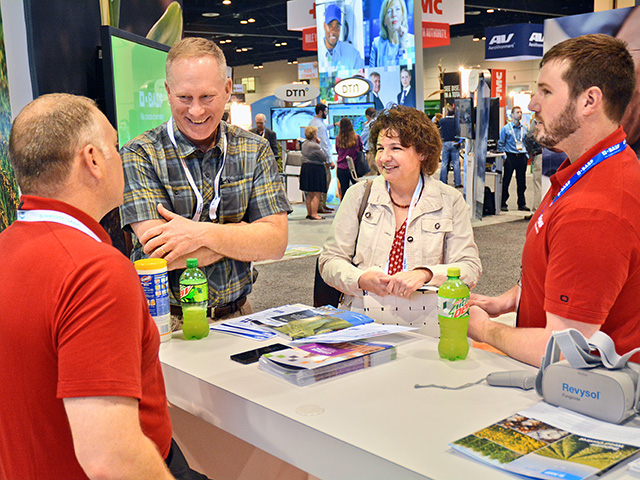 BASF representatives discuss the companyâ€™s new products with Iowa farmers Joe and Suzanne Shirbroun, Image by Matthew Wilde